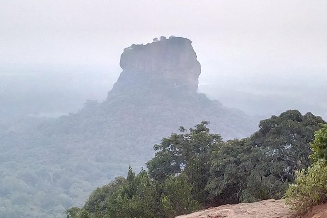 All inclusive Private day trip Sigiriya and Dambulla caves with more - Dambulla Cave Temple after the climb