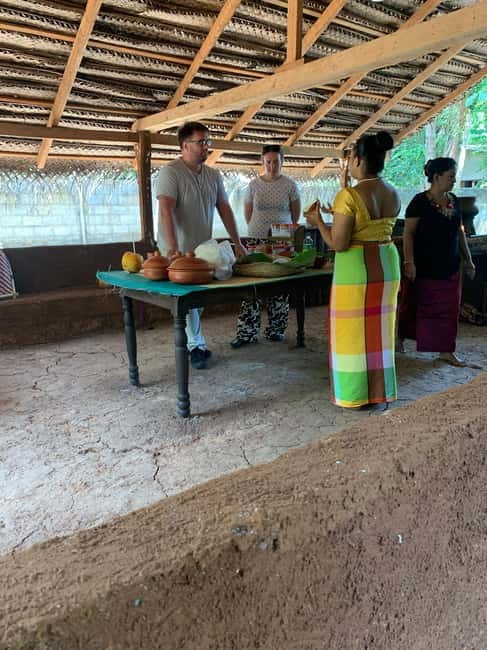 Anuradhapura: Traditional Milk Rice Cooking Class - Scraping coconut with the hiramanaya