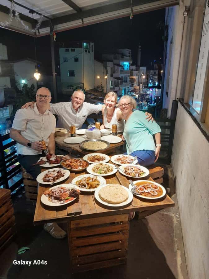 Colombo Foods Tour by Tuk Tuk ( Food chargers included ) - Pettah snacks: cheese balls and samosas on the move